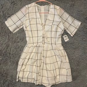 White Charlotte Russe Romper, size Small, tags still on.